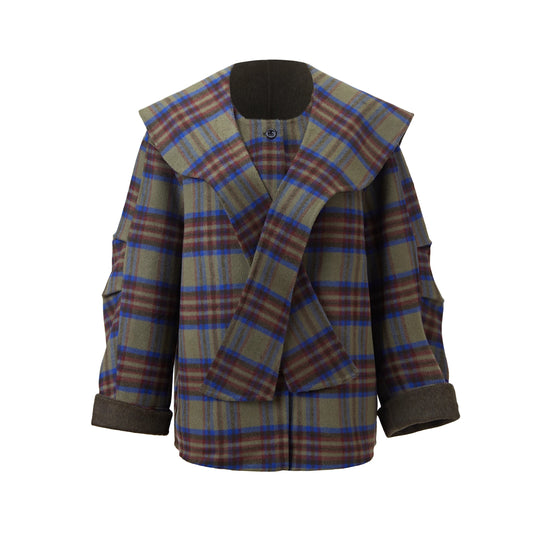 Manteau court à carreaux avec col large et fermeture croisée